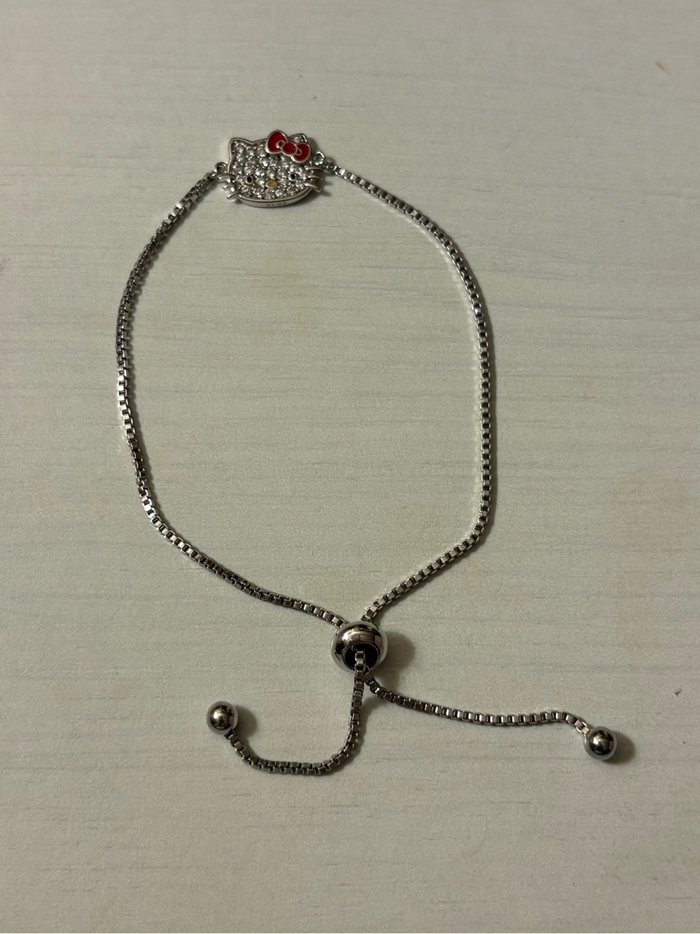Hello Kitty Silver Slider Bracelet with Red Bow Accent